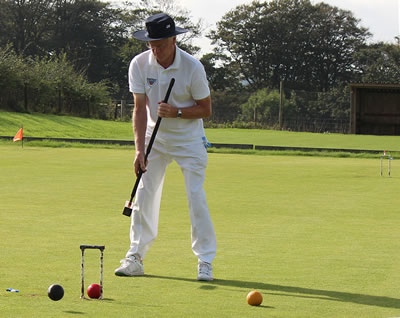 President's Cup Golf Croquet level play, 
David Edwards jumps hoop 8